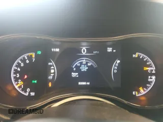 2021 Jeep Grand Cherokee Trailhawk with VIN 1C4RJFLG7MC766876, listed as a Copart auction lot 57228665 with 50,398 mi miles and Salvage title. Bid and sale history available at DreamBid. Image 9.