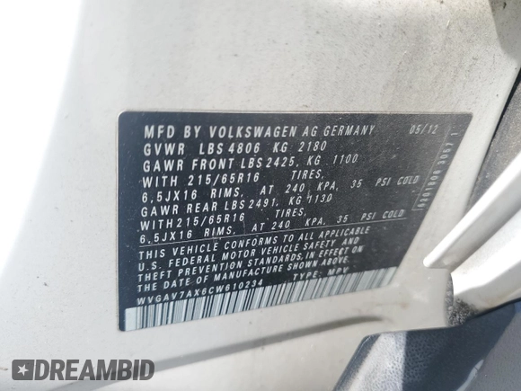 2012 Volkswagen Tiguan SE z VIN WVGAV7AX6CW610234, wystawiony jako Copart lot #57620505 z przebiegiem 71 730 mil mil oraz Czysty tytuł • Clean title. Historia ofert i sprzedaży dostępna na DreamBid. Obrazek 13.
