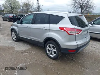 2016 Ford Escape SE with VIN 1FMCU9GX3GUA96262, listed as a IAAI auction lot 41915524 with 64,434 mi miles and . Bid and sale history available at DreamBid. Image 3.