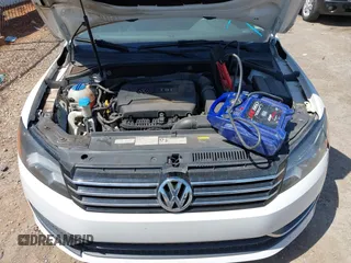 2015 Volkswagen Passat Wolfsburg Edition with VIN 1VWAT7A33FC047606, listed as a IAAI auction lot 42034665 with 165,233 mi miles and . Bid and sale history available at DreamBid. Image 10.