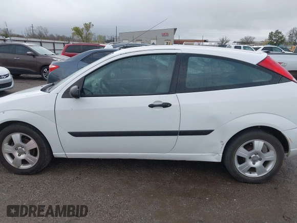 2004 Ford Focus ZX3 with VIN 3FAFP31Z94R120332, listed as a IAAI auction lot 40772071 with 218,128 mi miles and . Bid and sale history available at DreamBid. Image 15.