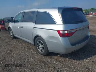 2012 Honda Odyssey EX-L with VIN 5FNRL5H65CB039015, listed as a IAAI auction lot 42612886 with 216,955 mi miles and . Bid and sale history available at DreamBid. Image 3.