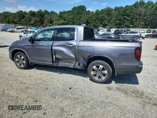 2017 Honda Ridgeline RTL-E with VIN 5FPYK3F79HB031142, listed as a Copart auction lot 62365885 with 134,517 mi miles and Salvage title. Bid and sale history available at DreamBid. Image 2.