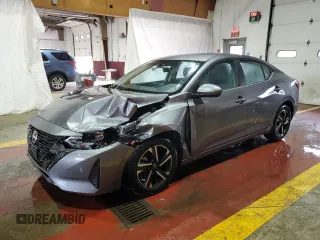 2024 Nissan Sentra SV z VIN 3N1AB8CV2RY289005, wystawiony jako Copart lot #60613405 z przebiegiem 22 959 mil mil oraz Szkoda całkowita • Salvage title. Historia ofert i sprzedaży dostępna na DreamBid. Obrazek 1.
