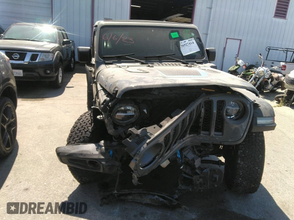 2022 Jeep Wrangler Unlimited Rubicon with VIN 1C4JJXR60NW182756, listed as a IAAI auction lot 36927414 with Not provided miles and . Bid and sale history available at DreamBid. Image 12.