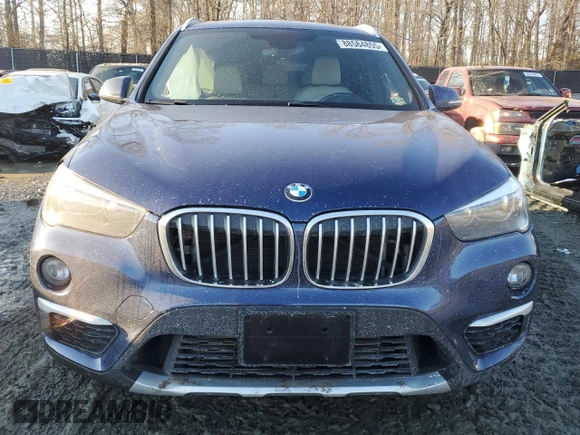 2018 BMW X1 xDrive28i with VIN WBXHT3C32J3H31391, listed as a Copart auction lot 88584855 with 32,441 mi miles and Salvage Title. Bid and sale history available at DreamBid. Image 5.