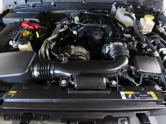 2023 Jeep Gladiator Freedom with VIN 1C6JJTAG9PL557861, listed as a Copart auction lot 56429485 with 44,716 mi miles and Salvage title. Bid and sale history available at DreamBid. Image 7.