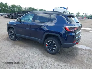 2021 Jeep Compass Trailhawk with VIN 3C4NJDDB0MT590442, listed as a IAAI auction lot 42543530 with 66,669 mi miles and . Bid and sale history available at DreamBid. Image 3.