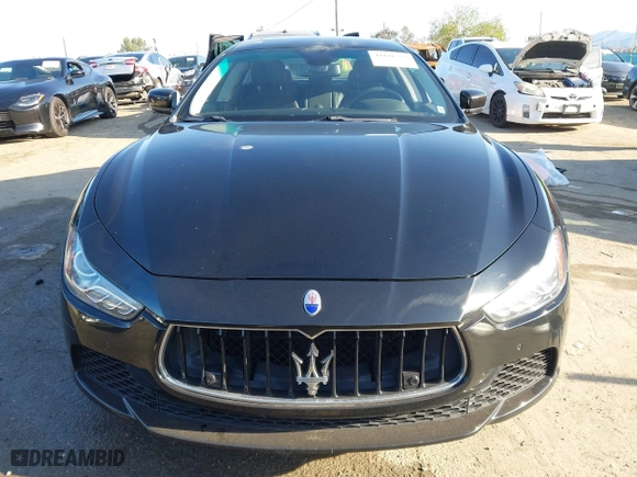 2014 Maserati Ghibli S Q4 with VIN ZAM57RTA2E1086046, listed as a IAAI auction lot 41846389 with 55,984 mi miles. Bid and sale history available at carsss.com. Image 12.