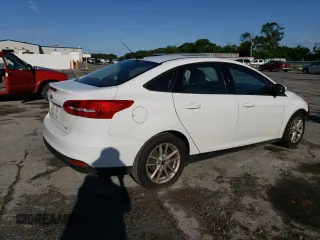 2017 Ford Focus SE with VIN 1FADP3F28HL309268, listed as a Copart auction lot 57995985 with 99,277 mi miles and Salvage title. Bid and sale history available at DreamBid. Image 3.