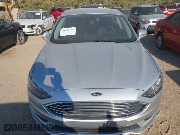 2017 Ford Fusion SE z VIN 3FA6P0H73HR236618, wystawiony jako IAAI lot #40734739 z przebiegiem 189 000 mil mil oraz . Historia ofert i sprzedaży dostępna na DreamBid. Obrazek 12.