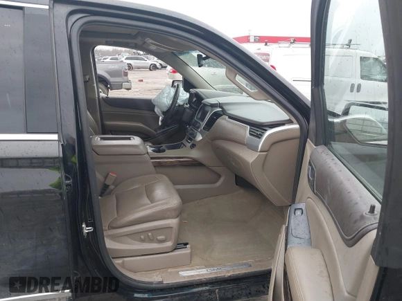 2016 GMC Yukon SLT with VIN 1GKS1BKC9GR480199, listed as a IAAI auction lot 41352032 with 146,716 mi miles. Bid and sale history available at carsss.com. Image 5.