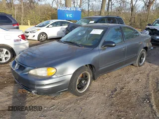 2005 Pontiac Grand Am SE with VIN 1G2NE52E75M151497, listed as a IAAI auction lot 40847757 with 140,300 mi miles. Bid and sale history available at carsss.com. Image 2.