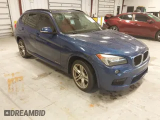 2015 BMW X1 xDrive28i with VIN WBAVL1C57FVY35998, listed as a IAAI auction lot 41740072 with 84,233 mi miles. Bid and sale history available at carsss.com. Image 1.
