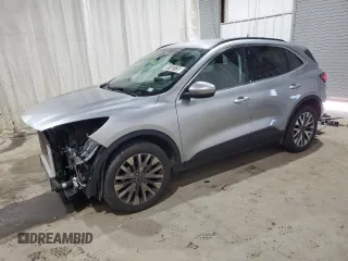 2021 Ford Escape Titanium с VIN 1FMCU9J91MUA57921, выставлен на аукционе Copart как лот 59155135 с пробегом 80 391 миль миль и Чистый • Clean title. История ставок и продаж доступна на DreamBid. Изображение 1.