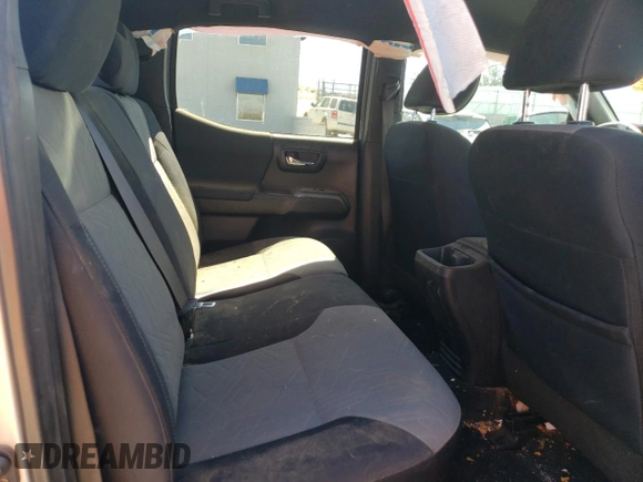 2022 Toyota Tacoma SR with VIN 3TMCZ5AN4NM470997, listed as a Copart auction lot 55165855 with 67,161 mi miles and Salvage title. Bid and sale history available at DreamBid. Image 10.