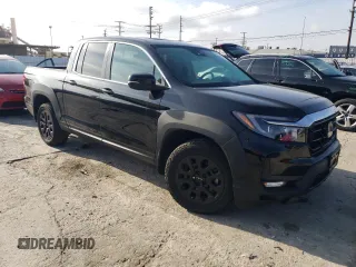 2023 Honda Ridgeline RTL with VIN 5FPYK3F52PB023574, listed as a Copart auction lot 44419565 with 15,205 mi miles and Salvage title. Bid and sale history available at DreamBid. Image 4.