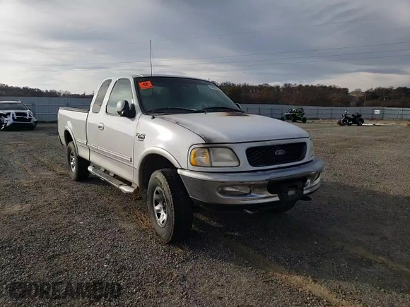 1998 Ford F-250 with VIN 1FTPX28L4WKA41149, listed as a Copart auction lot 84369654 with 430,187 mi miles and Salvage title. Bid and sale history available at DreamBid. Image 11.