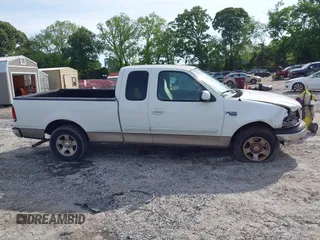 2001 Ford F-150 XL z VIN 1FTRX17WX1NA20036, wystawiony jako IAAI lot #42231600 z przebiegiem 181 549 mil mil oraz . Historia ofert i sprzedaży dostępna na DreamBid. Obrazek 13.