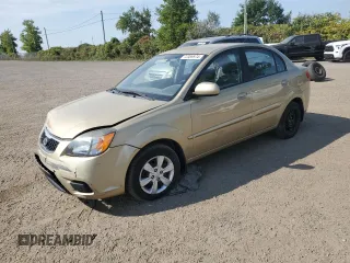 2011 Kia Rio with VIN KNADH4B38B6725531, listed as a Copart auction lot 72389974 with 124,315 mi miles and Salvage Title. Bid and sale history available at DreamBid. Image 1.