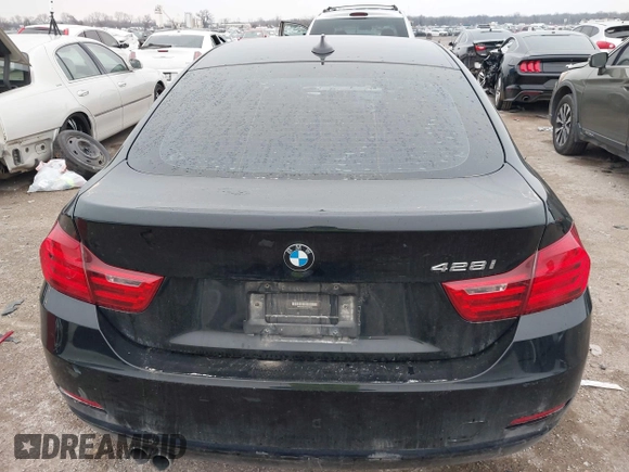 2015 BMW 4 Series 428i with VIN WBA4A9C54FD416870, listed as a IAAI auction lot 41593977 with 99,314 mi miles and . Bid and sale history available at DreamBid. Image 16.