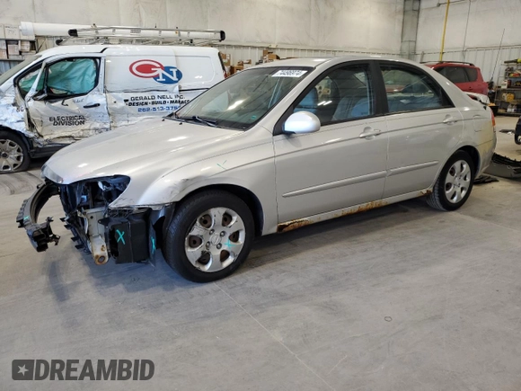 2009 Kia Spectra EX with VIN KNAFE221X95650545, listed as a Copart auction lot 74496974 with 203,752 mi miles and Non Repairable. Bid and sale history available at carsss.com. Image 1.
