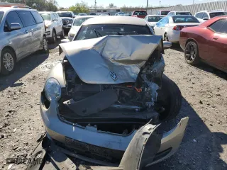 2012 Volkswagen Beetle 2.5L w/Sun/Sound/Nav PZEV with VIN 3VWHP7AT4CM659410, listed as a Copart auction lot 80688104 with 0 mi miles and Salvage Title. Bid and sale history available at carsss.com. Image 5.