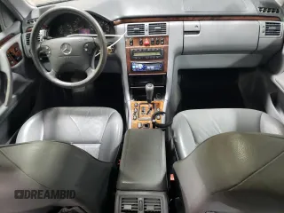 2000 Mercedes-Benz E-Class with VIN WDBJF82J1YX030388, listed as a Copart auction lot 86384974 with 212,596 mi miles and Salvage Title. Bid and sale history available at carsss.com. Image 8.