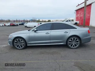 2013 Audi A6 Prestige z VIN WAUHGAFC2DN009441, wystawiony jako IAAI lot #41848400 z przebiegiem 147 198 mil mil oraz . Historia ofert i sprzedaży dostępna na DreamBid. Obrazek 14.