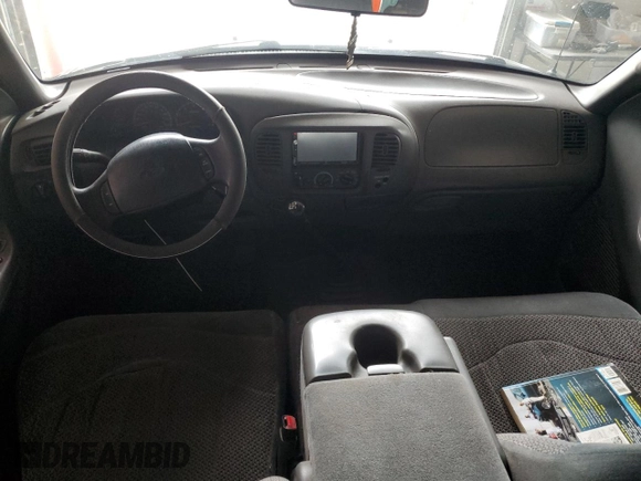 1999 Ford F-150 with VIN 1FTZX1723XNA24144, listed as a Copart auction lot 58071155 with 320,829 mi miles and Salvage title. Bid and sale history available at DreamBid. Image 8.