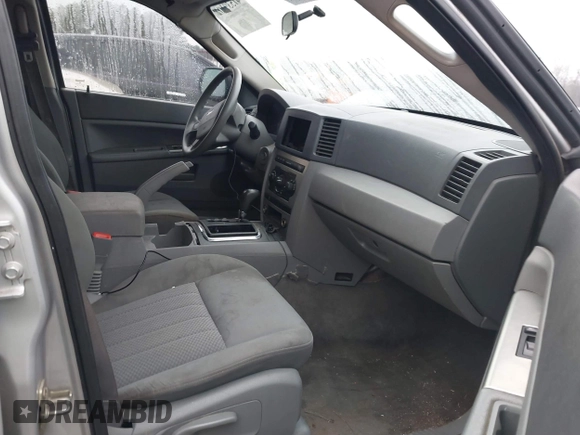 2005 Jeep Grand Cherokee Laredo z VIN 1J4GR48K05C506865, wystawiony jako IAAI lot #41539102 z przebiegiem 237 208 mil mil oraz . Historia ofert i sprzedaży dostępna na DreamBid. Obrazek 5.