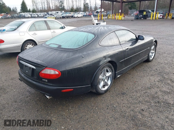 1997 Jaguar XK with VIN SAJGX5741VC004596, listed as a IAAI auction lot 41588751 with 188,607 mi miles and . Bid and sale history available at DreamBid. Image 4.