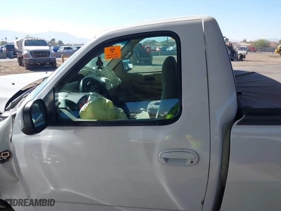 1999 Ford F-150 Work Series with VIN 1FTRF17W0XKA35108, listed as a IAAI auction lot 41383313 with 1 mi miles. Bid and sale history available at carsss.com. Image 14.