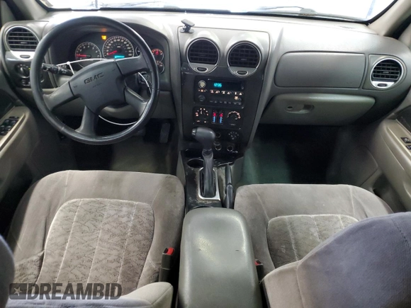 2004 GMC Envoy SLE with VIN 1GKDS13S442417232, listed as a Copart auction lot 51821225 with 242,945 mi miles and Salvage Title. Bid and sale history available at carsss.com. Image 8.