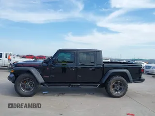 2021 Jeep Gladiator Rubicon z VIN 1C6JJTBG6ML535939, wystawiony jako IAAI lot #42260764 z przebiegiem 114 060 mil mil oraz . Historia ofert i sprzedaży dostępna na DreamBid. Obrazek 14.