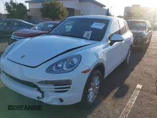 2014 Porsche Cayenne with VIN WP1AA2A28ELA96123, listed as a IAAI auction lot 42010456 with 154,312 mi miles and . Bid and sale history available at DreamBid. Image 20.
