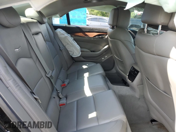 2014 Cadillac CTS RWD с VIN 1G6AP5SXXE0147735, выставлен на аукционе Copart как лот 61308495 с пробегом 61 184 миль миль и Списание • Salvage title. История ставок и продаж доступна на DreamBid. Изображение 10.