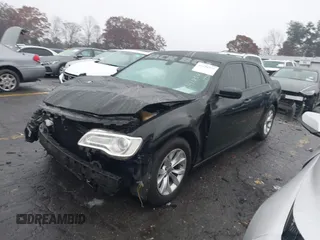 2015 Chrysler 300 Limited with VIN 2C3CCAAG8FH807168, listed as a IAAI auction lot 41056399 with Not Provided miles. Bid and sale history available at carsss.com. Image 17.