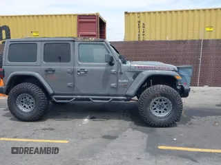 2020 Jeep Wrangler Unlimited Rubicon с VIN 1C4JJXFM4LW100382, выставлен на аукционе IAAI как лот 42338687 с пробегом Не указан миль и . История ставок и продаж доступна на DreamBid. Изображение 12.