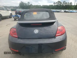 2014 Volkswagen Beetle 1.8T w/Premium z VIN 3VW517AT6EM816698, wystawiony jako Copart lot #57344055 z przebiegiem 52 782 mil mil oraz Szkody całkowita. Historia ofert i sprzedaży dostępna na DreamBid. Obrazek 6.
