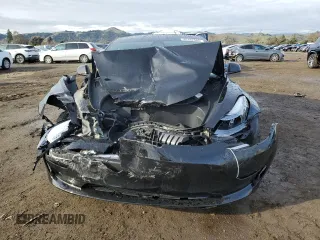 2023 Tesla Model 3 z VIN 5YJ3E1EA5PF695044, wystawiony jako Copart lot #45182665 z przebiegiem 21 104 mil mil oraz Szkoda całkowita • Salvage title. Historia ofert i sprzedaży dostępna na DreamBid. Obrazek 5.
