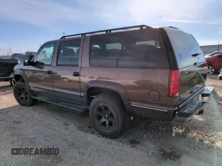 1998 GMC Suburban z VIN 3GKFK16R4WG507685, wystawiony jako Copart lot #87900735 z przebiegiem 183 033 mil mil oraz Szkoda całkowita • Salvage title. Historia ofert i sprzedaży dostępna na DreamBid. Obrazek 2.