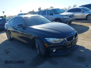 2014 BMW 4 Series 428i with VIN WBA3N7C55EK221259, listed as a IAAI auction lot 41322781 with 100,274 mi miles and . Bid and sale history available at carsss.com. Image 1.