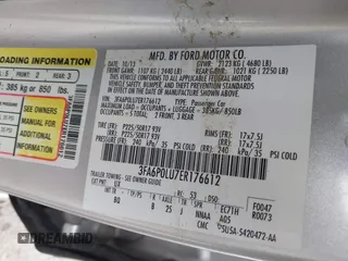 2014 Ford Fusion SE Hybrid with VIN 3FA6P0LU7ER176612, listed as a IAAI auction lot 41456075 with 101,621 mi miles and . Bid and sale history available at DreamBid. Image 9.