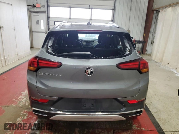 2021 Buick Encore GX Essence z VIN KL4MMGSL3MB170153, wystawiony jako Copart lot #52774345 z przebiegiem 81 292 mil mil oraz Szkoda całkowita • Salvage title. Historia ofert i sprzedaży dostępna na DreamBid. Obrazek 6.