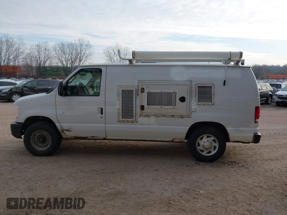 2013 Ford Econoline Cargo Commercial with VIN 1FTNE2EL6DDB01466, listed as a IAAI auction lot 41172240 with 173,124 mi miles and . Bid and sale history available at DreamBid. Image 14.