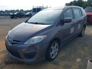 2010 Mazda 5 Sport z VIN JM1CR2W37A0365602, wystawiony jako IAAI lot #42816134 z przebiegiem 154 620 mil mil oraz . Historia ofert i sprzedaży dostępna na DreamBid. Obrazek 2.