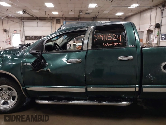 2002 Dodge 1500 with VIN 3B7HA18N02G113497, listed as a IAAI auction lot 39911524 with 127,262 mi miles and . Bid and sale history available at DreamBid. Image 11.