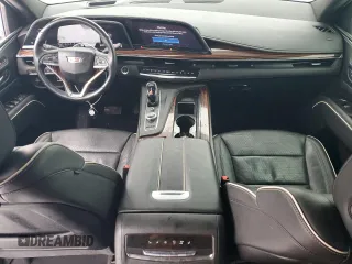 2021 Cadillac Escalade Premium Luxury with VIN 1GYS4BKL4MR414197, listed as a Copart auction lot 88093605 with 63,196 mi miles and Salvage title. Bid and sale history available at DreamBid. Image 8.