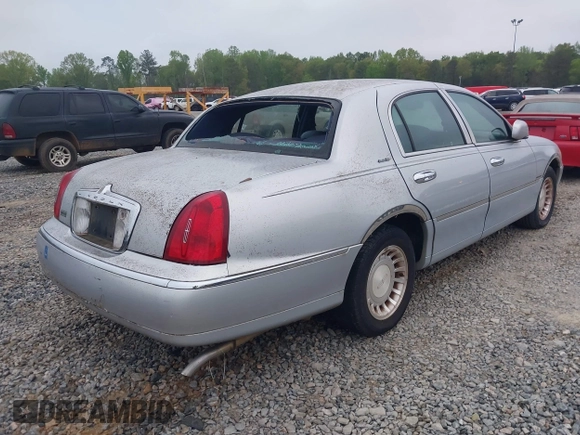 2001 Lincoln Town Car Executive with VIN 1LNHM81W91Y684733, listed as a IAAI auction lot 41949151 with 136,356 mi miles and . Bid and sale history available at DreamBid. Image 4.
